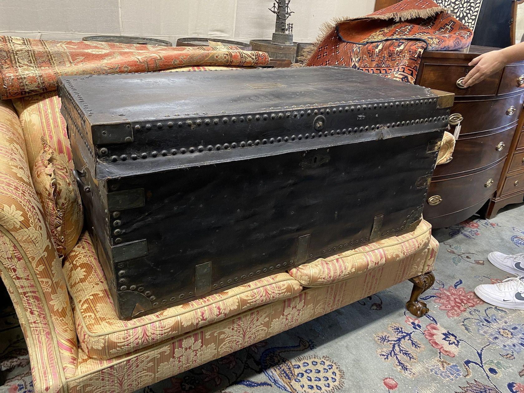 A Victorian studded black leather trunk, brass plaque inscribed Mr J Evans No. 2, width 107cm, depth 55cm, height 52cm